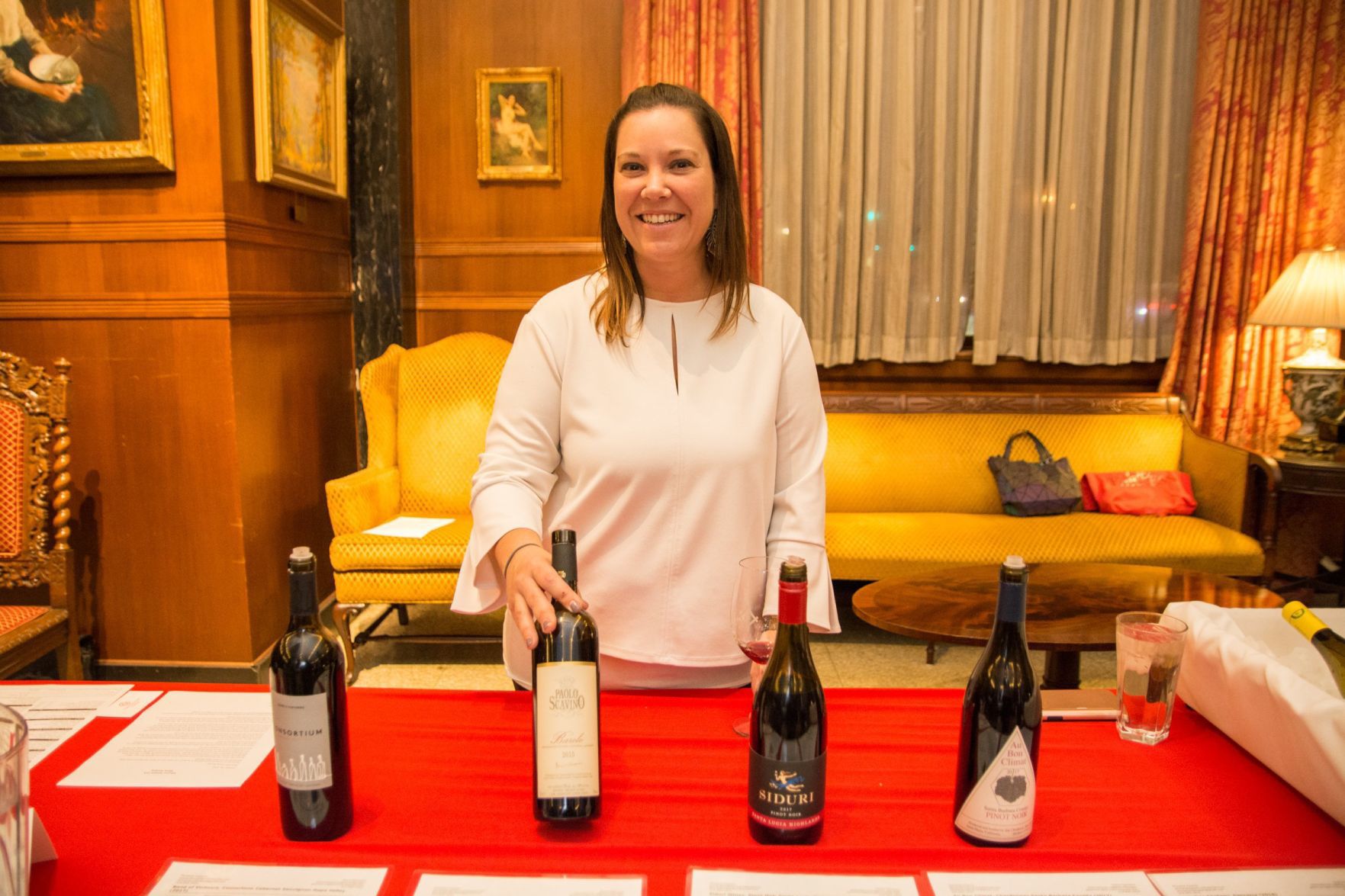 Angie Warrens of Pinnacle Imports shows some of their selection for the evening
